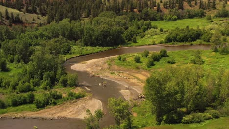 Riverside-Journey:-Overhead-View-of-Cariboo-Highway-Near-Clinton,-BC's-Green-Landscape