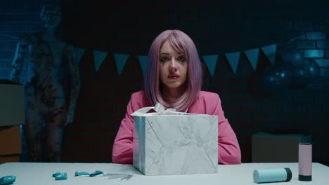 a sad woman at a birthday party