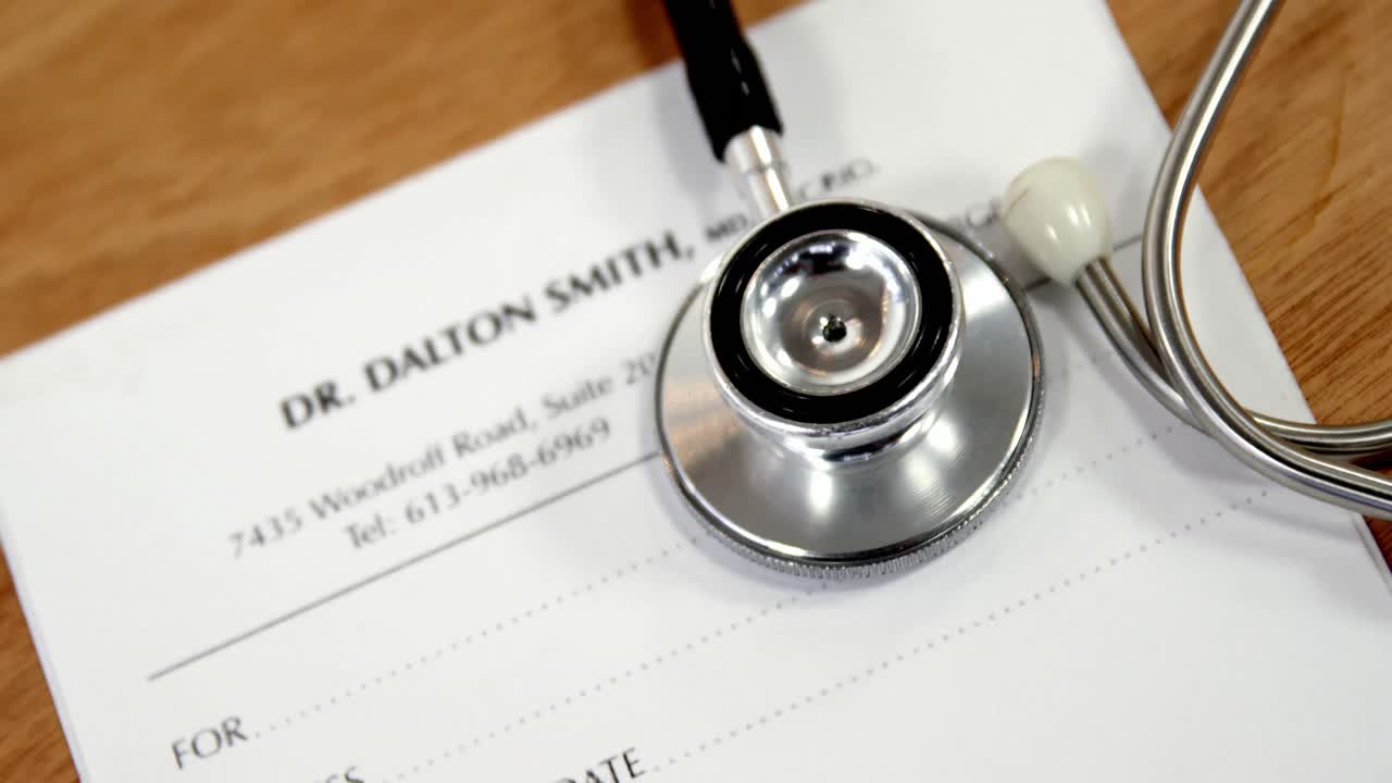 Close-up of paper with stethoscope