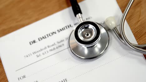 Close-up-of-paper-with-stethoscope