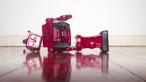 the red retro robot is broken (system fail concept ) stop motion loop