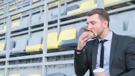 male office worker eating a burger and drinking co 4k 2025 07 22 04 42 48 utc.mov | burger, business, businessman, businessmen