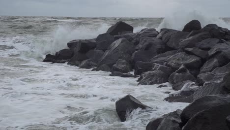 waves crashing rocks on the west coast of denmark