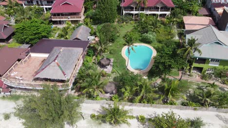 cocobana beach resort garden and tropical villa houses with outdoor patio swimming pool, malapascua island