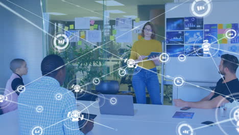 animation of network of connections with icons over diverse colleagues discussing work