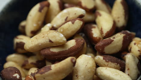 brazil nuts in a blue bowl