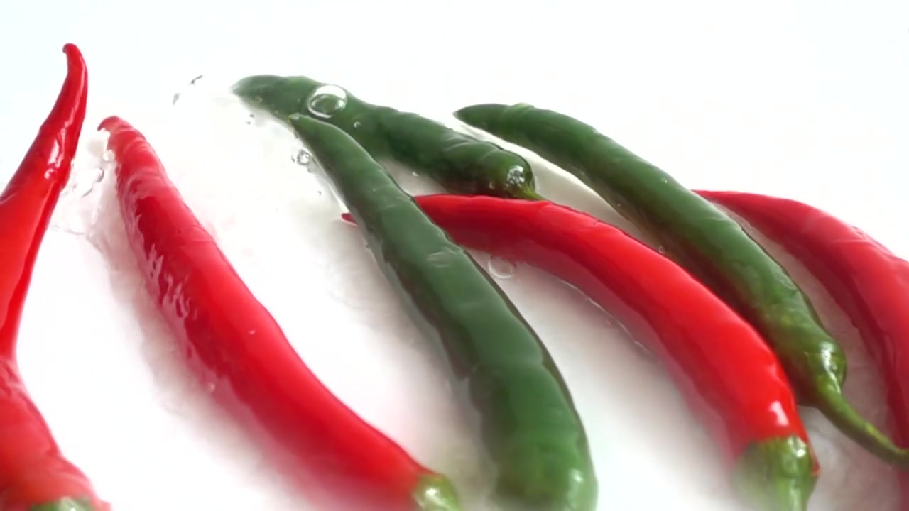 Fresh chili pepper. Slow motion.