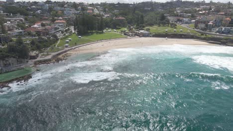 bird's eye view of bronte beach near public swimming pool - bronte park and beach in nsw, australia