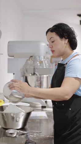 woman chef baking in a professional kitchen