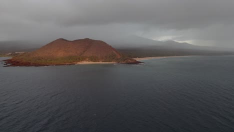 Cinematic-aerial-view-flying-over-tropical-white-sand-beach-at-sunset