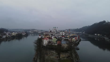 Passau-Germany-aerial-over-Oldtown-Danube-and-river-Inn-on-cloudy-day