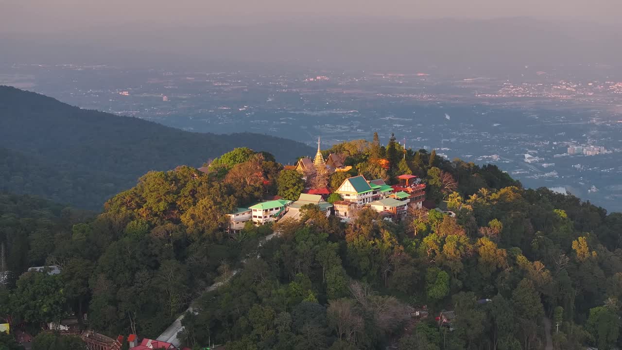 Doi Suthep Buddhist Temple during sunset. Amazing view of Chiang Mai landscape, Thailand.