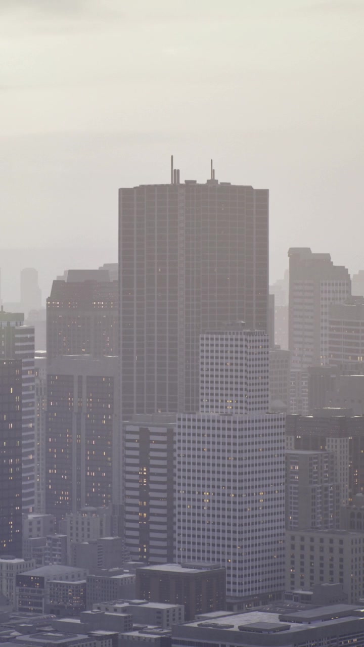 Horizonte de la ciudad con edificios entre la niebla durante las primeras horas de la mañana.