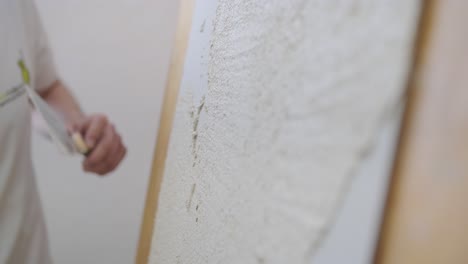 plastering a wall