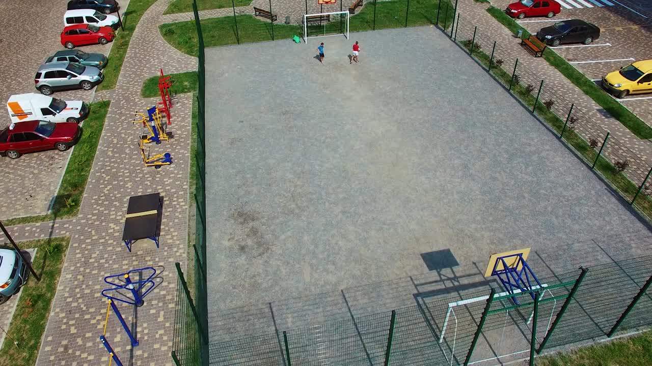 Apartment building with kids playground. Aerial view of playground for children in public house block