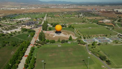 Aerial-view-over-the-Great-Park,-walking-path,-and-sports-fields-in-Irvine,-California