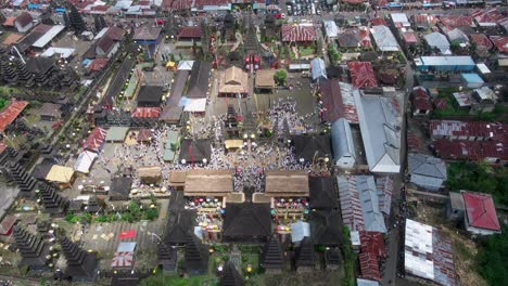 balinese religious hindu ceremony with local people attending ritual odalan in a temple called pura tuluk biyu near volcano batur