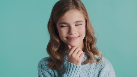 teenage caucasian girl thinking in front of the camera.