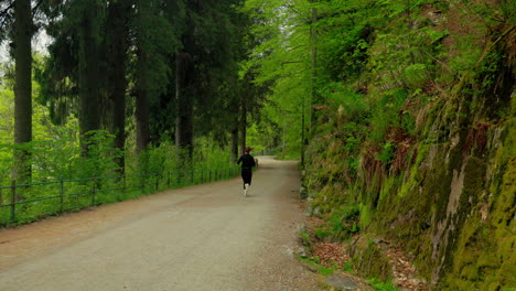 Female-jogger-moving-away-from-the-camera