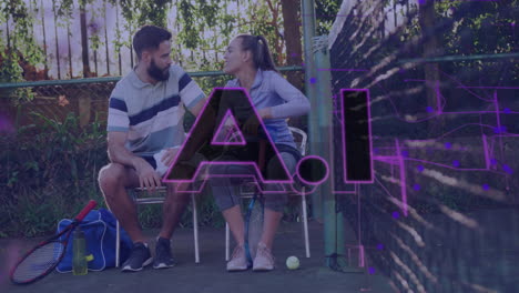 couple sitting on tennis court with a