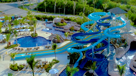 Aerial-of-people-splashing-down-at-the-landing-zone-of-the-watersides-at-an-exclusive-luxury-resort-,-Dominican-Republic