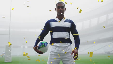 confeti cayendo sobre un jugador de rugby afroamericano que sostiene una pelota contra un estadio deportivo
