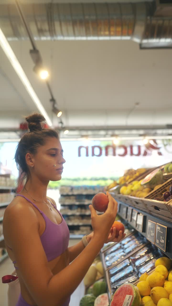 Young woman shops for fresh produce in a supermarket