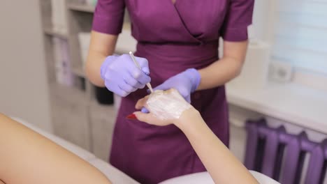 applying cream on the hand