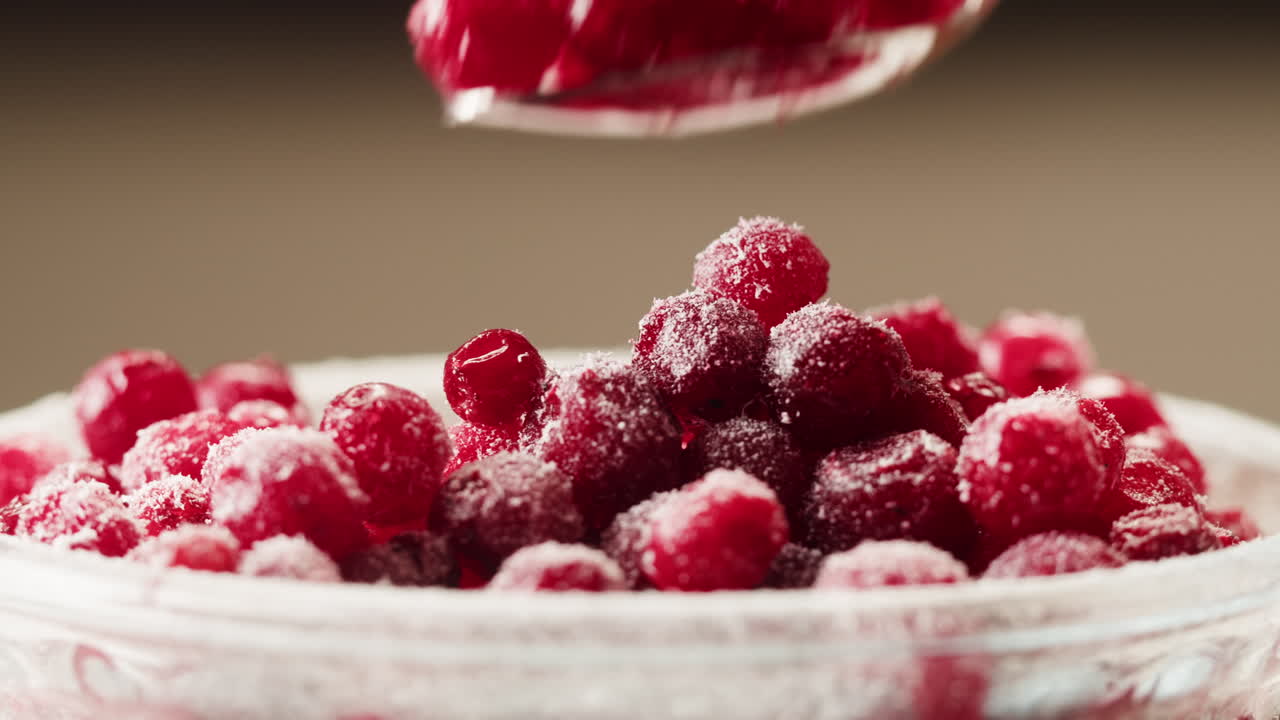 Frozen cranberries cooking for tea or jam, Background Close up of cranberry berries in on the kitchen, chef making dessert healthy pie.