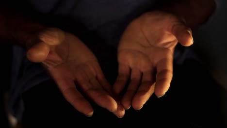 praying to god with hands together caribbean man praying with dark background stock video