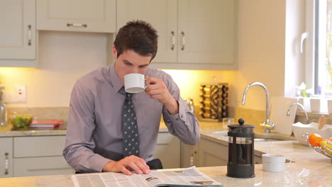 Man-reading-newspaper-