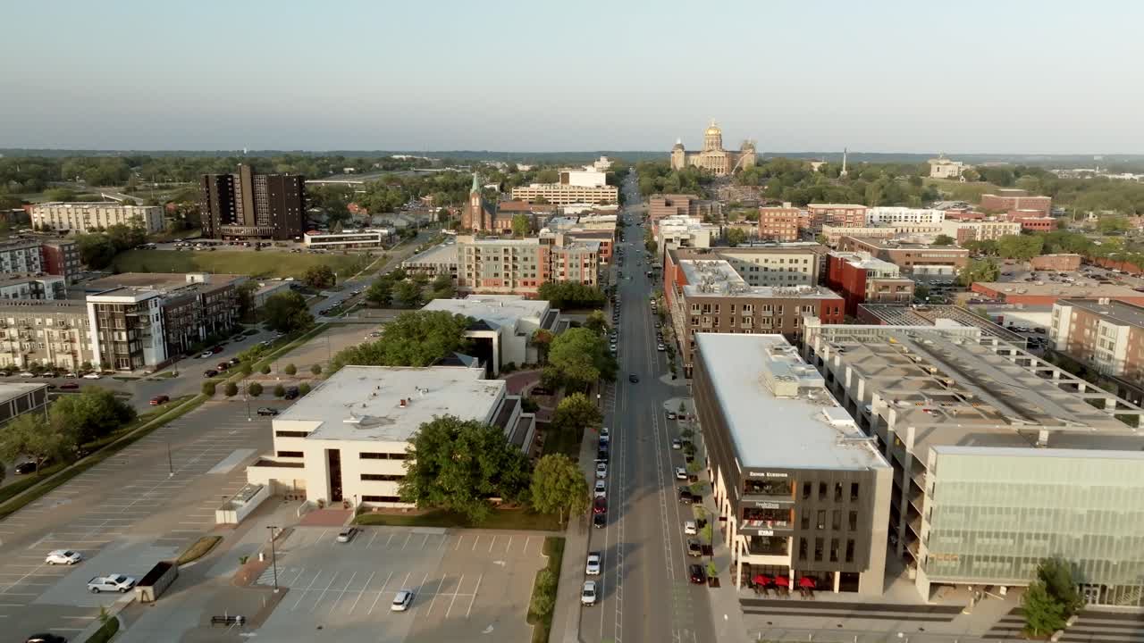 Downtown Des Moines, Iowa and Iowa state capitol building with drone video moving in