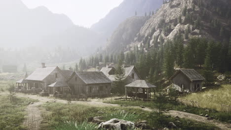 Rustic mountain village surrounded by misty mountains and tall trees