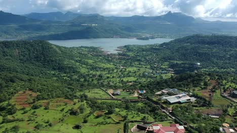 road trip on indian road in monsoon - rainy season seen here at dudhiware khind at lonavala, india - most selling stock aerial drone footage