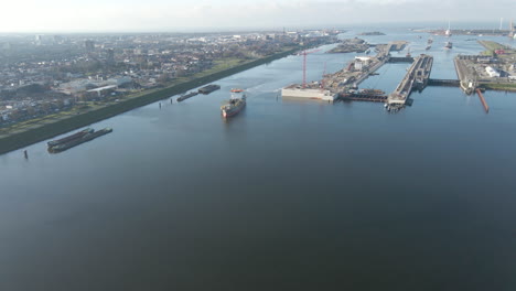 jib-down-of-ship-leaving-Ijmuiden-Sluis,-the-largest-sea-ship-lock-in-the-world