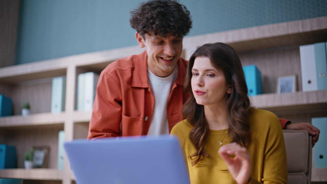 Friendly managers communicating videocall at modern company workplace closeup