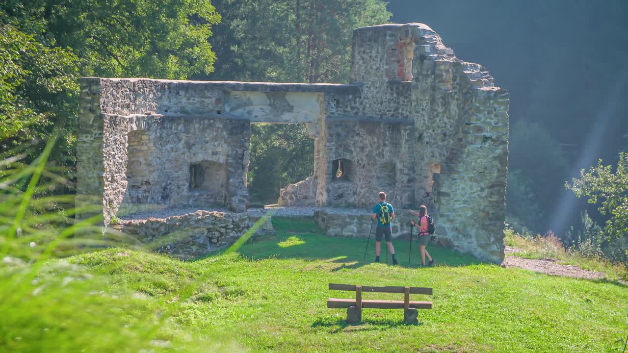 Fit Married Couple Hike Up To See Ancient Ruins While On Holiday