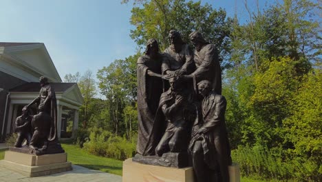 a statue at the visitors center restoration of the priesthood authority in the mormon or church of jesus christ of latter-day saints