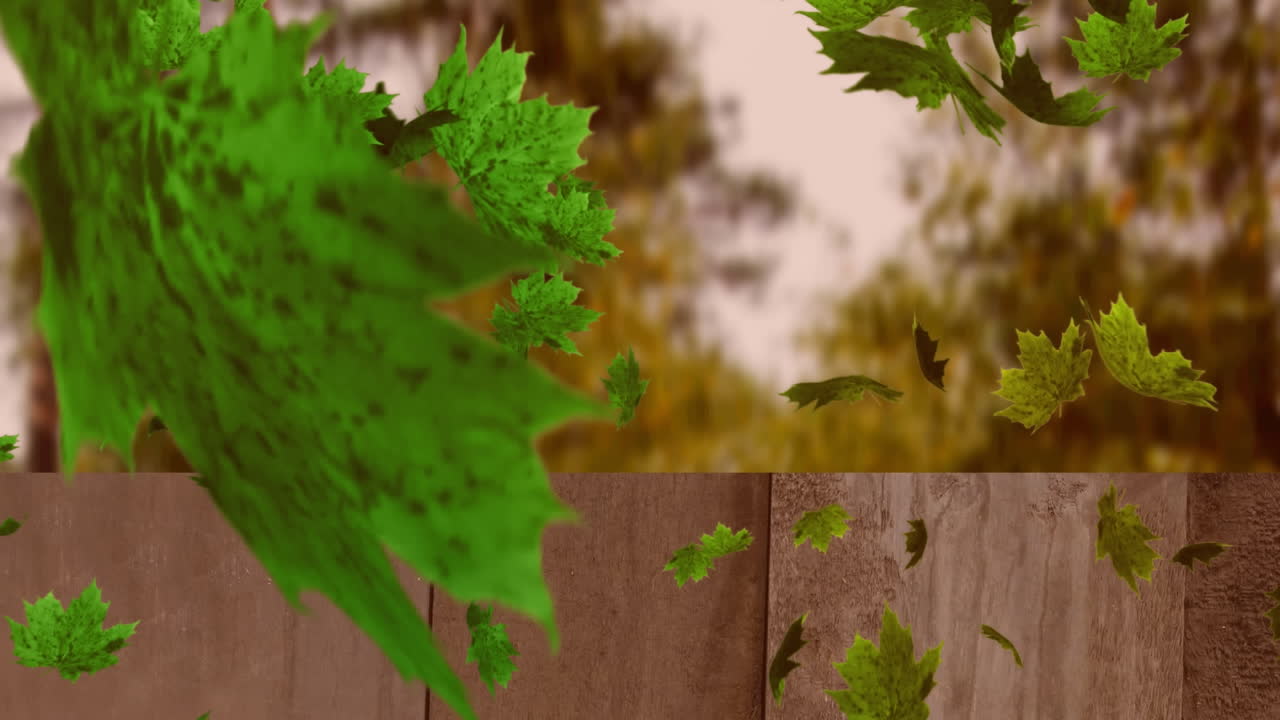 animación digital de múltiples hojas de otoño flotando sobre la superficie de madera contra el bosque