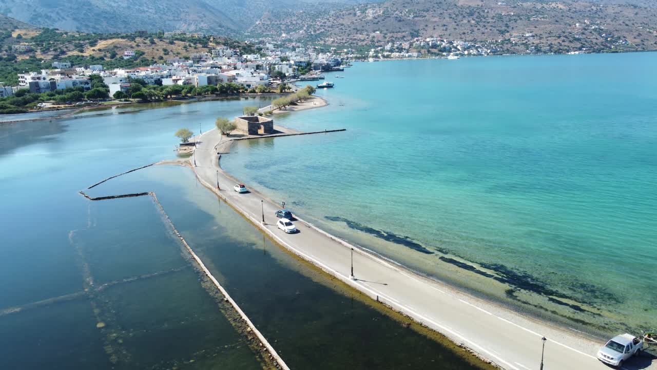 shallow lagoon and turquoise sea in the coastal village of Kato Gouves. Kato Gouves, Crete