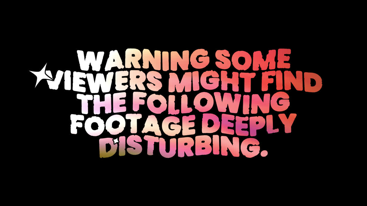 Warning Message for Disturbing Footage on Black Background
