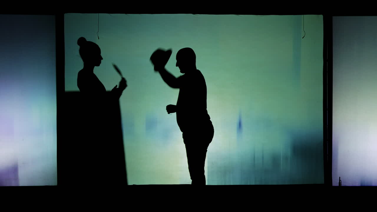 Silhouette of people on stage