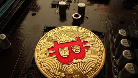 gold bit coin btc coins on the motherboard. bitcoin is a worldwide cryptocurrency and digital payment system called the first decentralized digital currency.