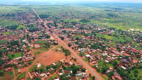 drone flying high over an african village market