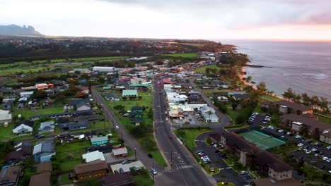 aerial view of a coastal town in hawaii at sunset