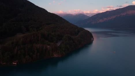 Aerial-view-of-the-cinematic-shore-of-lake-Thun-in-the-Bernese-Oberland