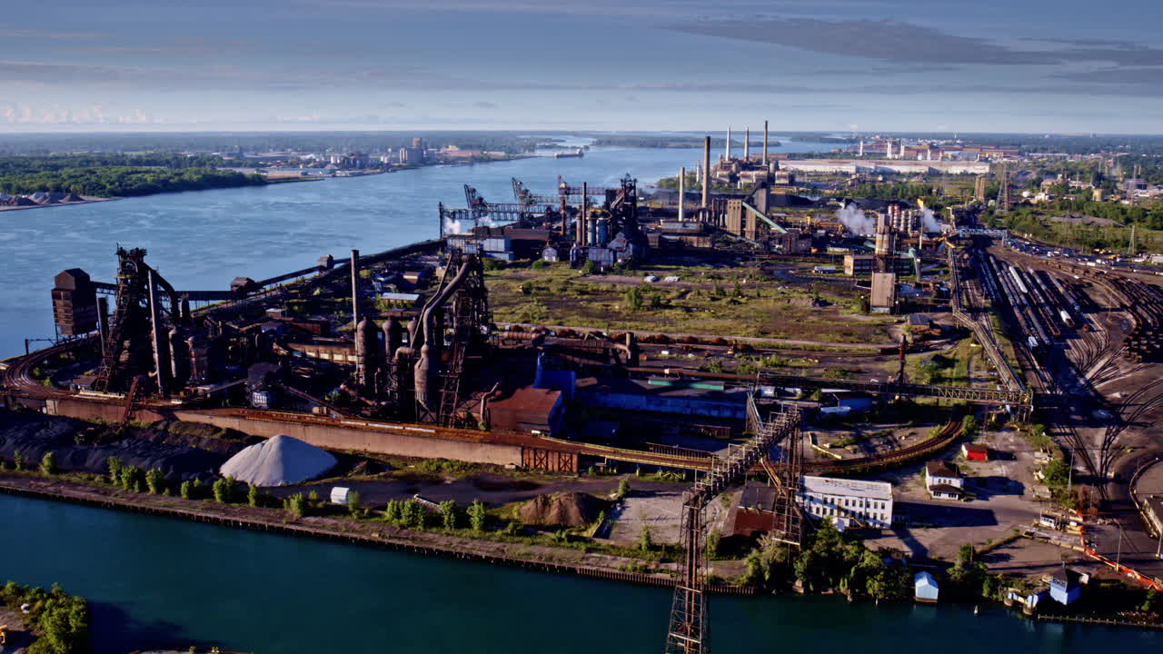 Epic aerial drone orbit shot highlighting the iconic international bridge joining Canada and the U.S
