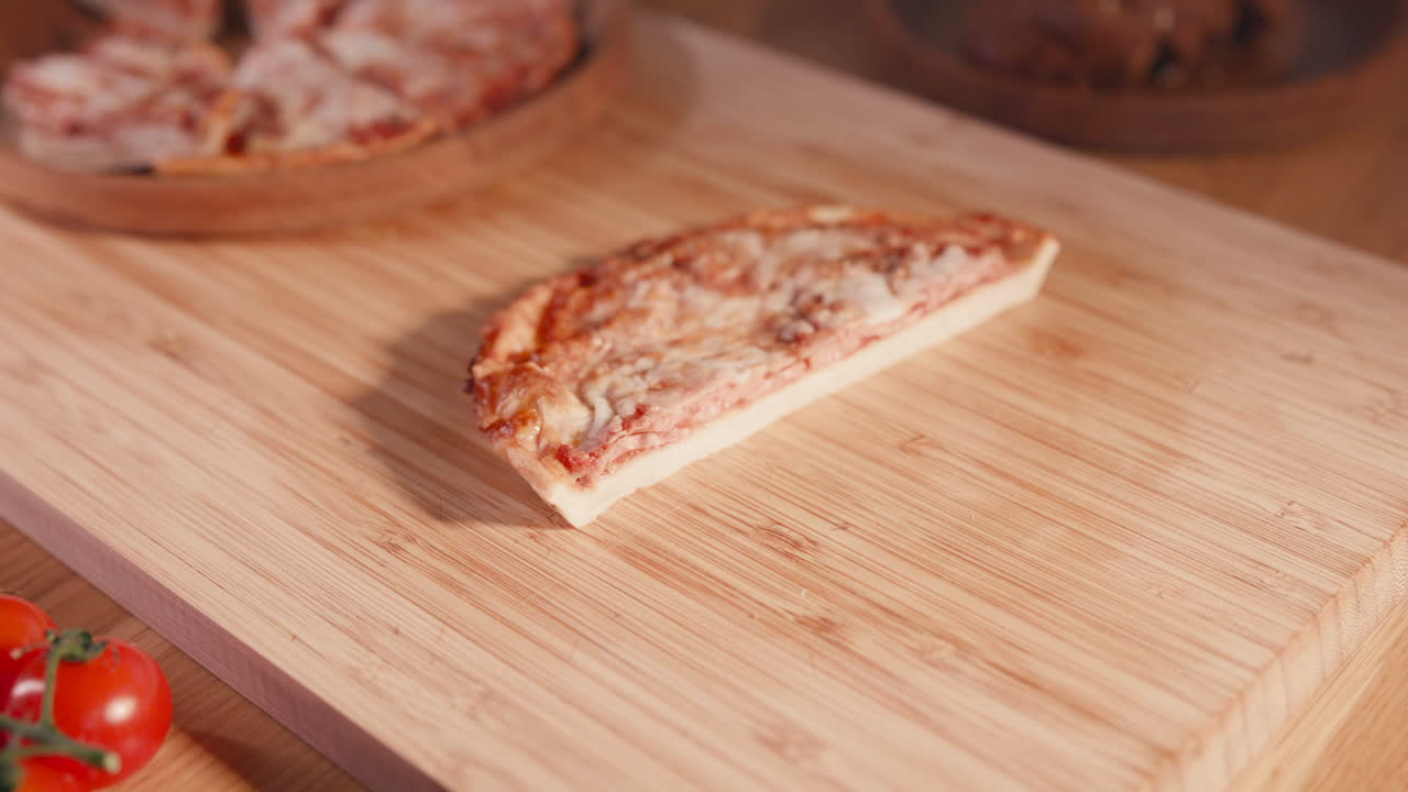 A pizza sliced on a cutting board