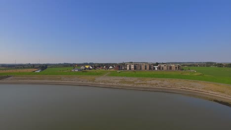 Aerial-shots-of-a-new-neighborhood-near-the-sea-in-Kruiningen,-the-Netherlands