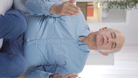 Vertical-video-of-Muslim-old-man-praying.